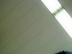 Upskirt of supermarket MILF in short skirt