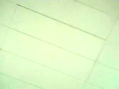 Upskirt of supermarket MILF in short skirt