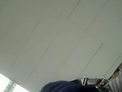 Upskirt of supermarket MILF in short skirt