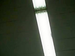 Upskirt of supermarket MILF in short skirt